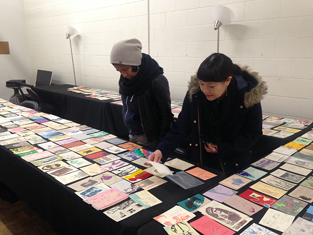 Women researching the Woman's Building archives at Metabolic Studios